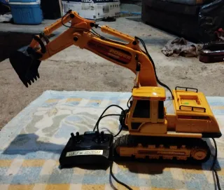 Grúa y camión bomberos juguete New Bright