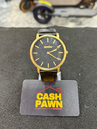 Reloj Nixon Bring It Negro/Dorado