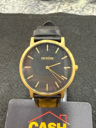 Reloj Nixon Bring It Negro/Dorado