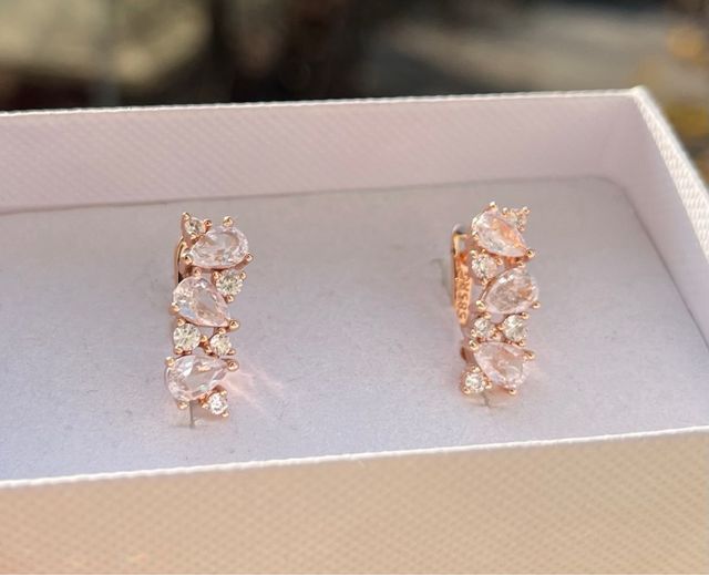 Orecchini laminati oro rosa 14 kt con zirconi