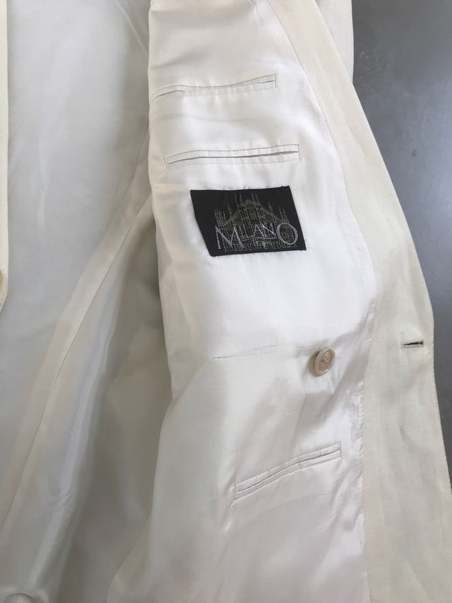 Chaqueta cruzada de lino beige caballero.