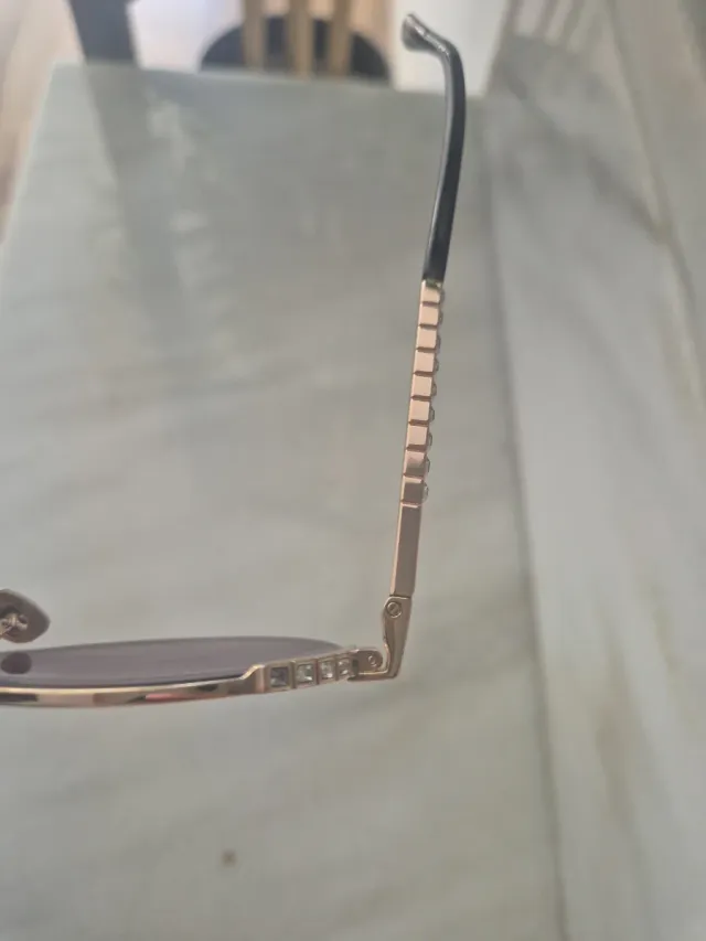 Occhiali da sole Chopard SHF14S dorati viola