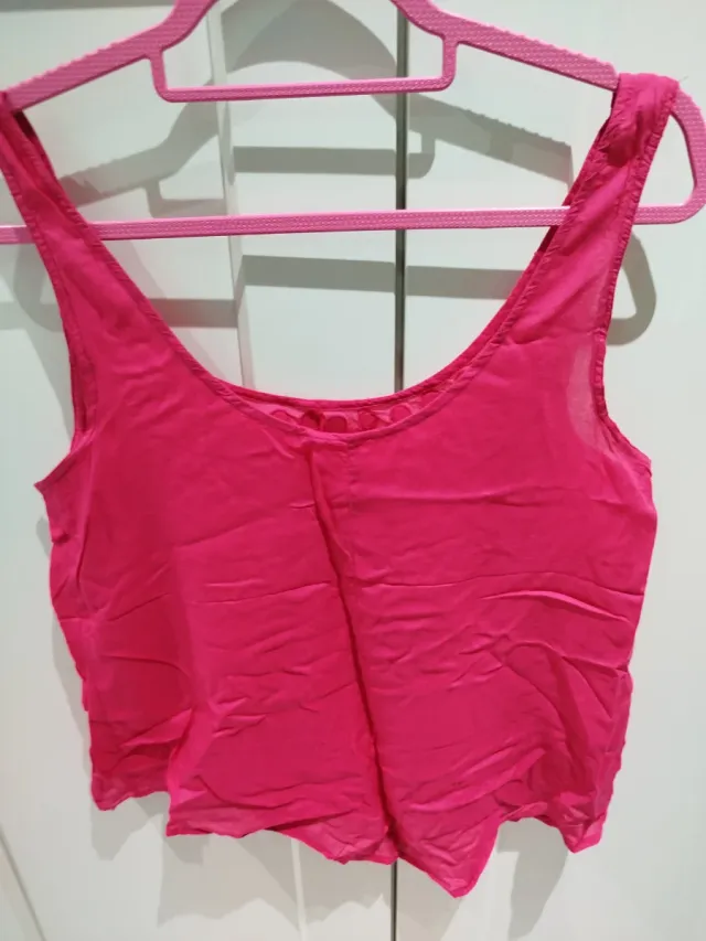 Blusa rosa con detalles espejo