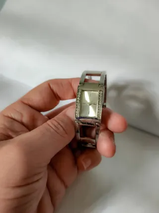 Reloj pulsera dorado y plateado