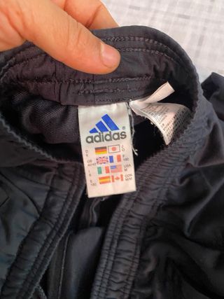 Pantalón de chándal Adidas gris y naranja