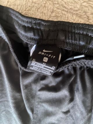 Pantalones Nike negros y blancos