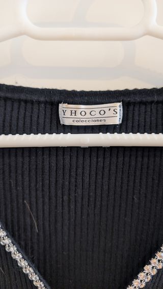 Chaqueta punto con cremallera brillante.