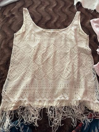 12 prendas de blusas, se puede vender por separado