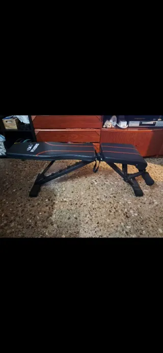 Banco de pesas y abdominales como nuevo