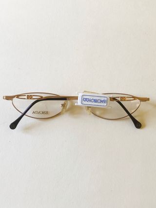 3-021-Montatura ESCADA ovali dorati nuovi 90