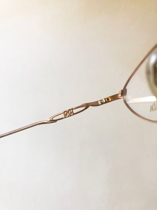 3-021-Montatura ESCADA ovali dorati nuovi 90