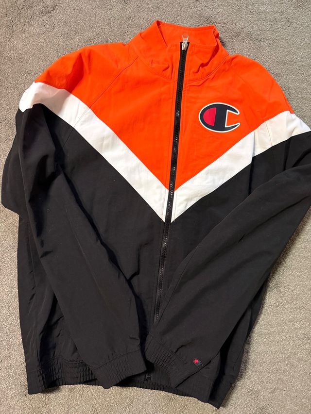Chaqueta Champion Naranja y Negra Talla S