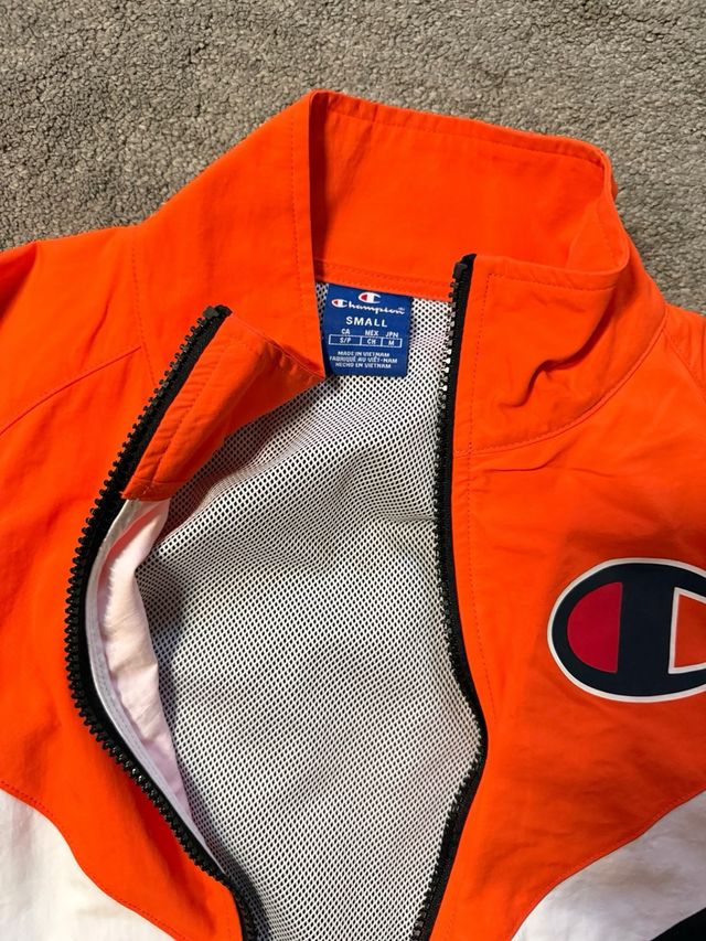 Chaqueta Champion Naranja y Negra Talla S