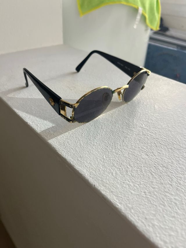 Gafas de sol Versace doradas y negras