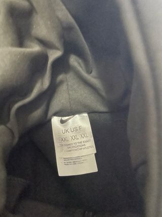 Chaqueta Nike Dri-Fit Negra con Rayas Blancas