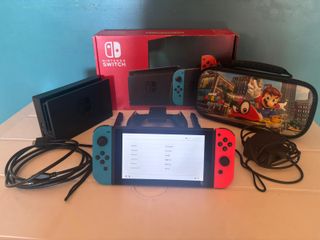 Nintendo Switch V2 + Custodia Mario Odyssey