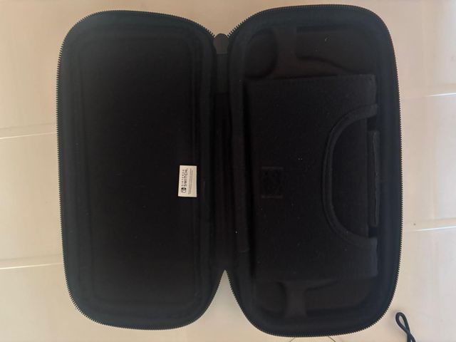 Nintendo Switch V2 + Custodia Mario Odyssey