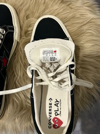 Converse x CDG sneakers nere con cuore rosso