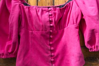 Top Uterqüe Fucsia Manga Abullonada