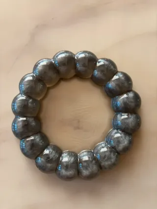 Svuotatasche in resina grigio trasparente