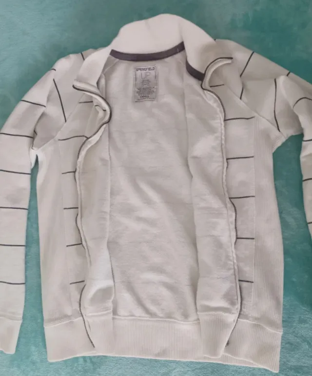 Chaqueta deportiva blanca con rayas