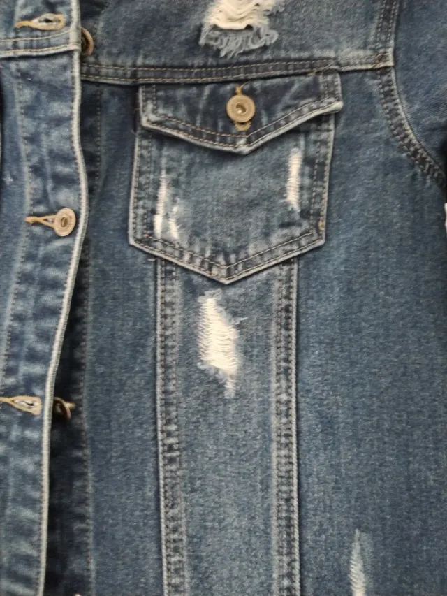 Cazadora vaquera larga desgastada