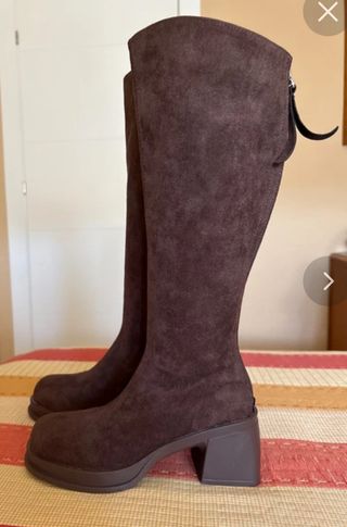 Botas altas ante marrón