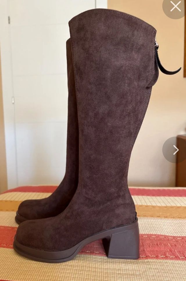 Botas altas ante marrón