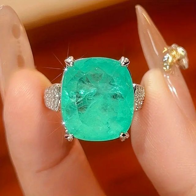 Anillo, Aretes y Collar.Paraiba Baño en Oro Blanco