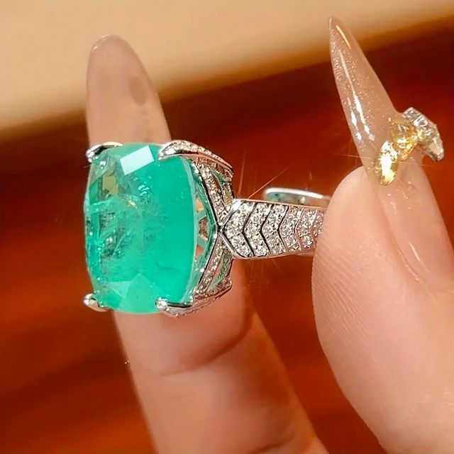 Anillo, Aretes y Collar.Paraiba Baño en Oro Blanco