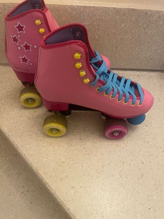 Patines de niña rosas con estrellas