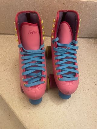 Patines de niña rosas con estrellas