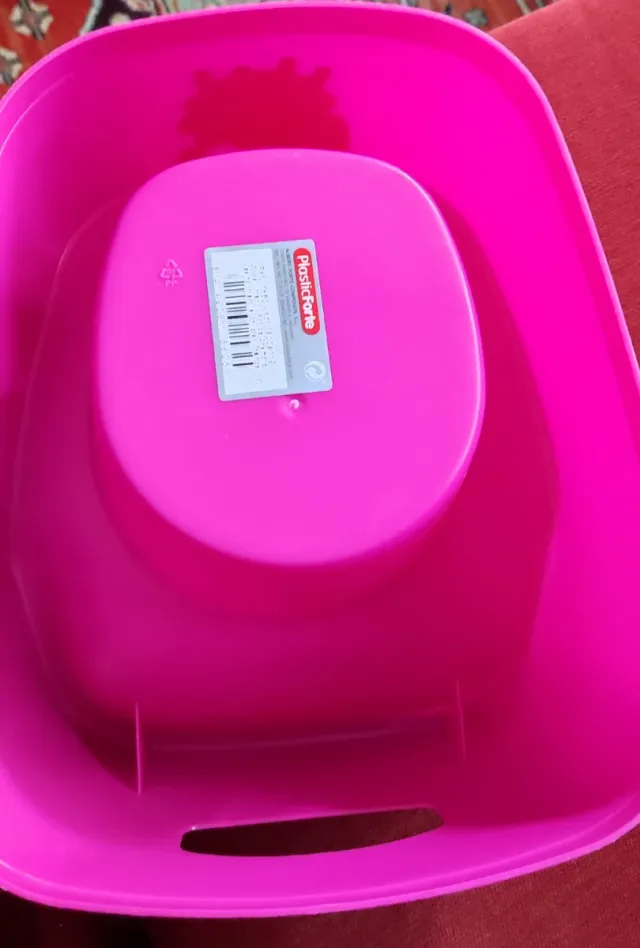 Orinal rosa plástico con oveja