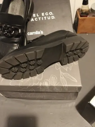 Mocasines negros con cadena