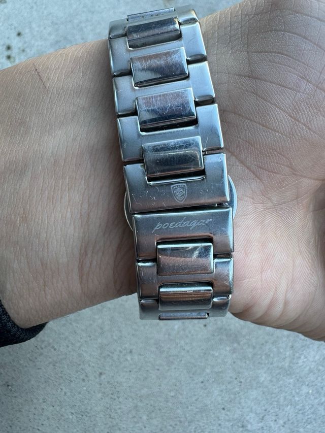 Reloj Poedagar Negro y Plateado Nuevo