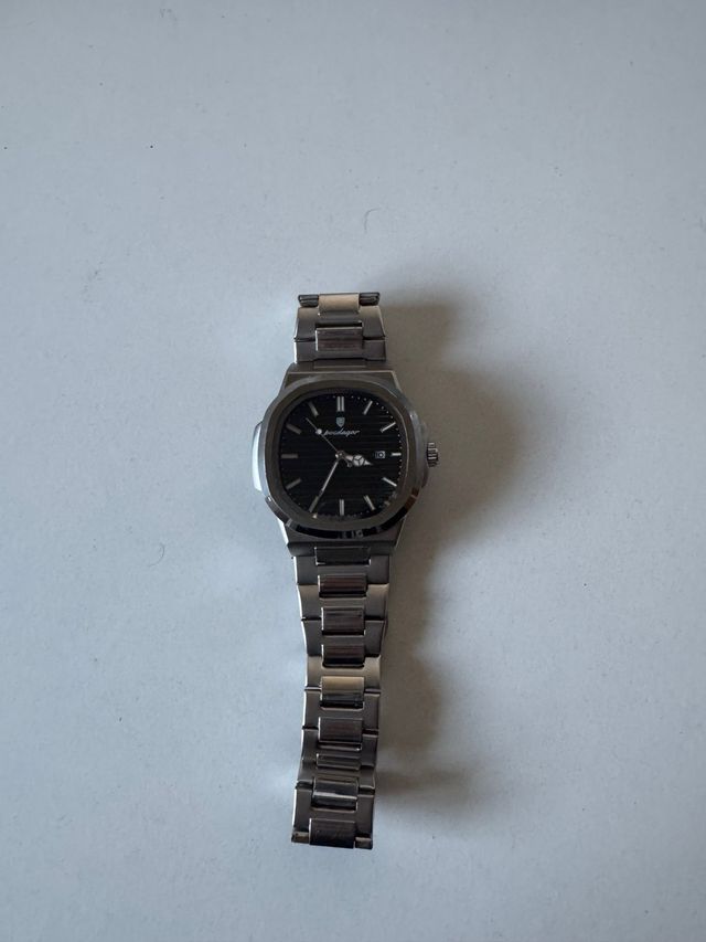 Reloj Poedagar Negro y Plateado Nuevo