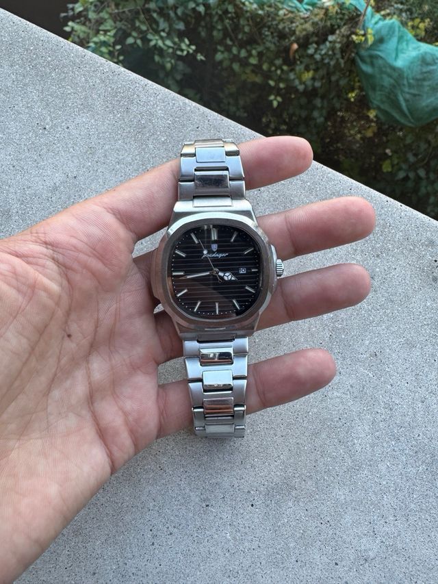 Reloj Poedagar Negro y Plateado Nuevo