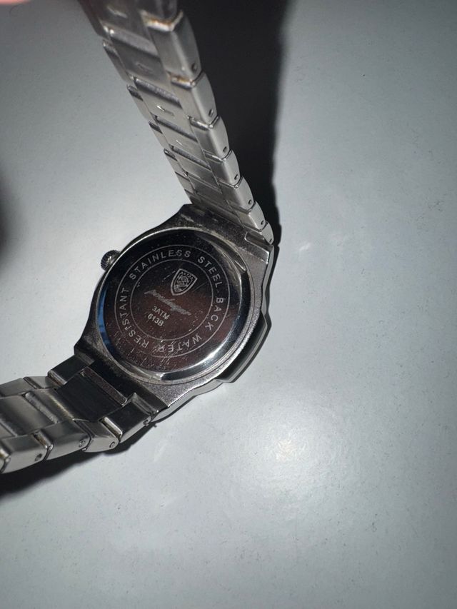 Reloj Poedagar Negro y Plateado Nuevo