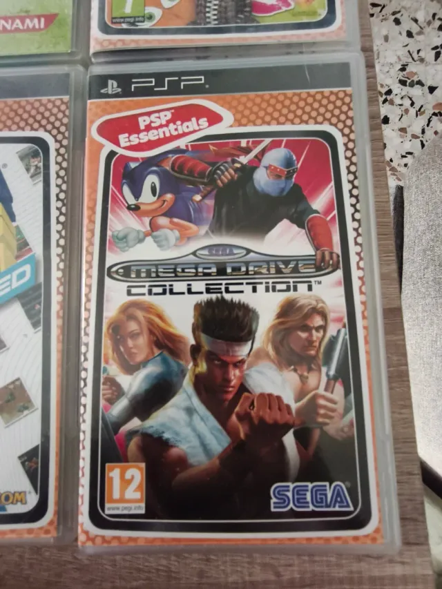 PSP Street + 8 juegos + cargador y funda