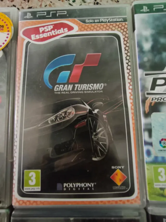 PSP Street + 8 juegos + cargador y funda