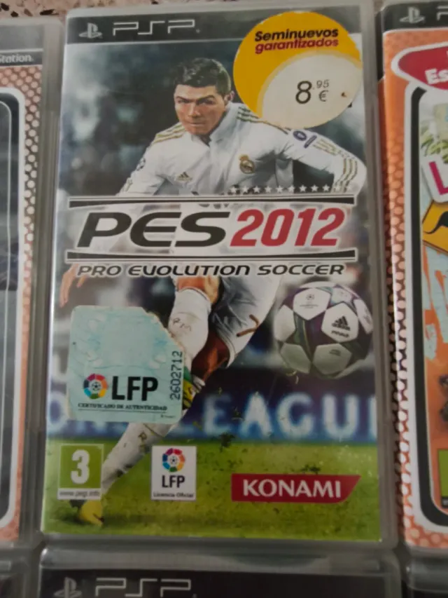 PSP Street + 8 juegos + cargador y funda