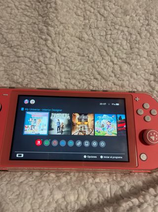 Nintendo Switch Lite Rosa + Custodia + Caricabatterie