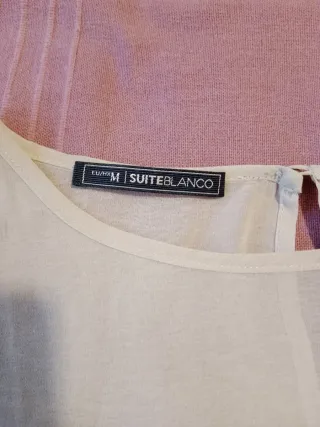 Blusa de lunares Talla M. Blanco