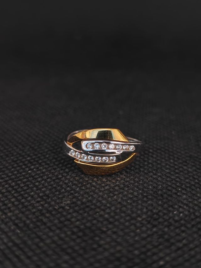 Anello in oro 18k con due ori e zirconi 051-01-00458