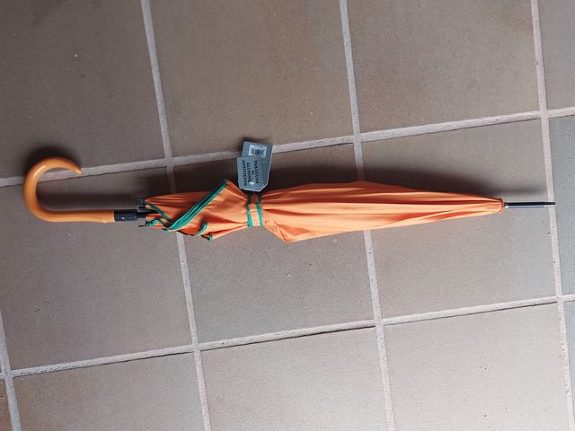 Paraguas automático naranja nuevo con etiquetas
