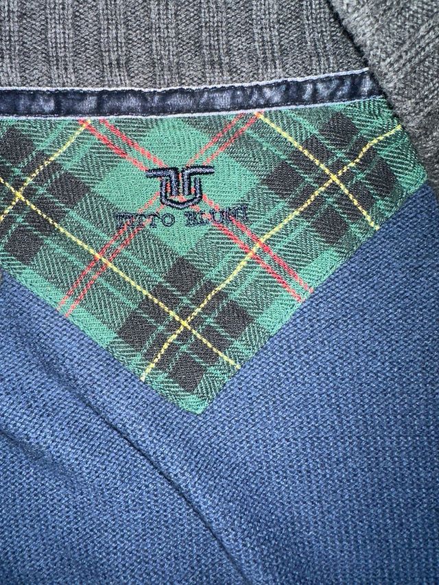 Chaqueta de punto azul y gris