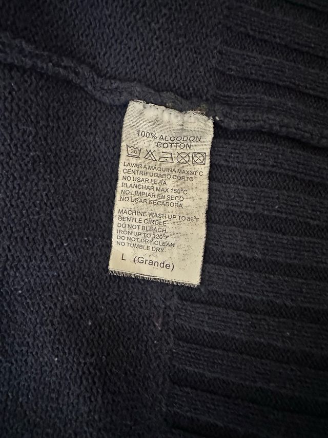 Chaqueta de punto azul y gris