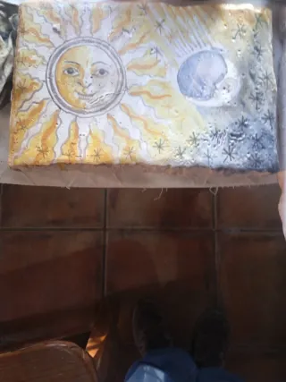 Azulejo antiguo decorado con grifo