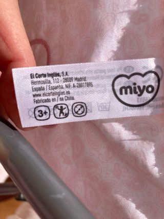 Carrito de muñecas rosas