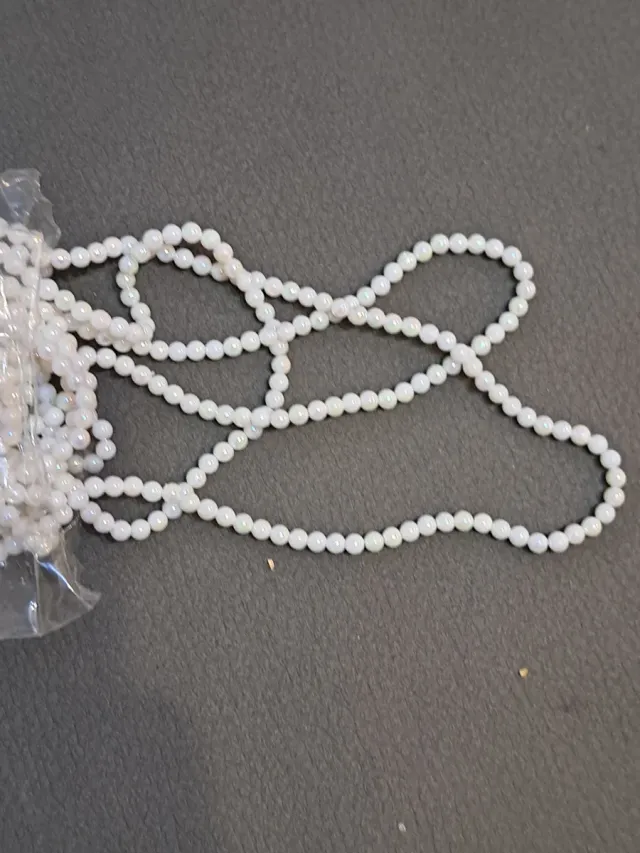 Bolsa de bolitas blancas para manualidades